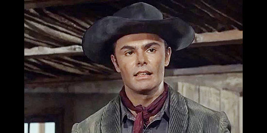 John Saxon as Dakin McAdam, the thief who blames his father for six years spent in prison in Winchester '73 (1967)