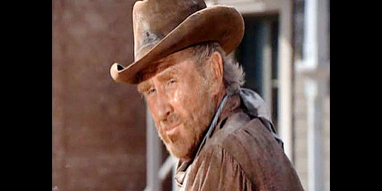 Lloyd Bridges as Brad Clinton, arriving in Coleville after a desperate shootout with Trace Evans and his friends in The SIlent Gun (1969)