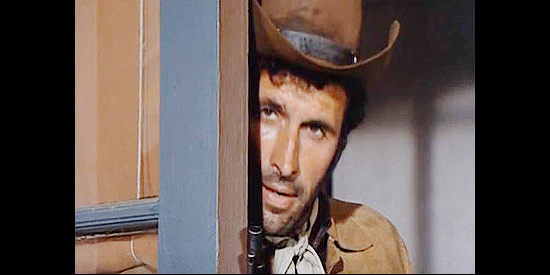 Michael Forest as Trace Evans, the man for whom Brad Clinton is gunning in The Silent Gun (1969)