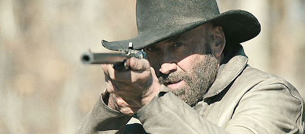 Nicolas Cage as Miller, ready to gun down another buffalo in Butcher's Crossing (2022)