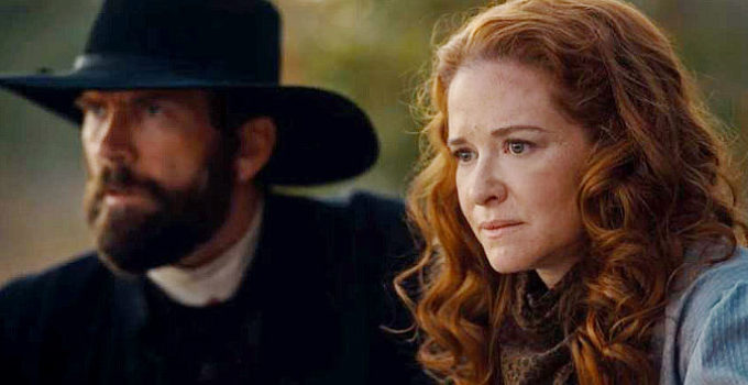 Lucas Black as Jeremiah Jacobs and Sara Drew as Mary Rose Jacobs, scouting the outlaw camp in Birthright Outlaw (2023)