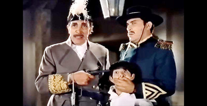 Antonio Prieto as Gov. Don Manuel Parades, threatening the life of young Diego in order to take Zorro into custoday in Sword of Zorro (1963)