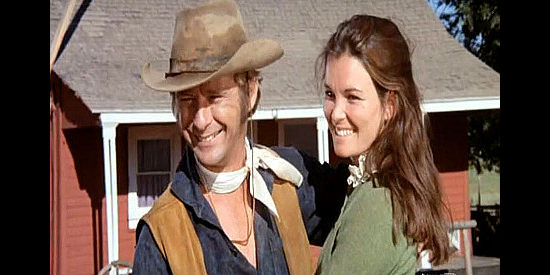 Paul Carr as Shep Barrenger and Victoria Thompson as his wife Sally, happy before a madman's visit in A Man for Hanging (1972)