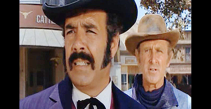 Pernell Roberts as Sam Benner and Lloyd Bridges as Brad Clinton during a climatic moment in The Silent Gun (1969)