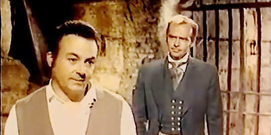 Rafael Romero Marchent as Juan Aguilar and Frank Latimore as Don Jose discuss the former's prospects in Zorro the Avenger (1962)