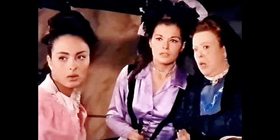 Anna Petrocchi as Ann, Gloria Milland as Virginia de Santa Anna and Pilar Gomez Ferrer as her governess, reacting as Zorro arrives to chase away bandits in Sword of Zorro (1963)