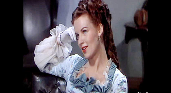 Helena Carter as Stephanie Morrison, a young woman uninterested in playing 'hard to get' in River Lady (1948)