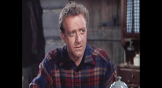 Lloyd Gough as Mike Riley, a friend of Dan Corrigan's, sympathizing with one of the woman who love him in River Lady (1948)