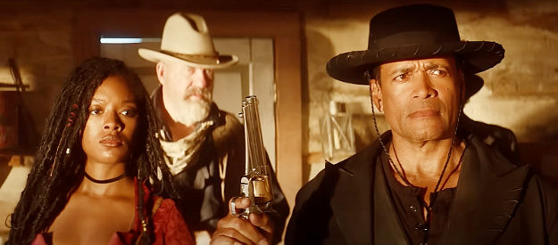 Amber Reign Smith as Queenie, John Carroll Lynch as Carson and Mario Van Peebles as Chief in Outlaw Posse (2024)