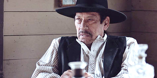 Danny Trejo as Digger, so named because he digs graves, sharing his tale of the Rufus Buck gang in The Night They Came Home (2023)