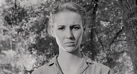 Lee, a young woman capable of arousing deadly jealousy in Mark of the Gun (1969)