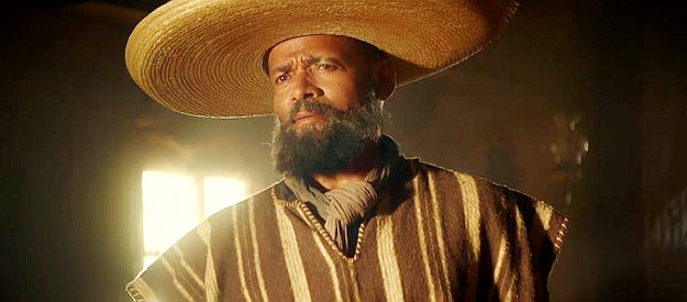 Mario Van Peebles as Chief, about to put a racist saloon customer in his place in Outlaw Posse (2024)