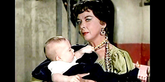 Ida Lupino as Mama Dolores, holding the infant the Rangers find on a train that's been robbed in Backtrack! (1969)