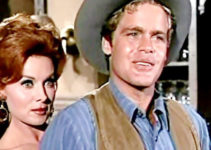 Rhonda Fleming as Carmelita Flanagan and Doug McClure as Trampas in Backtrack! (1969)