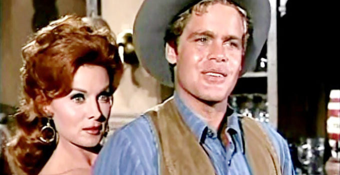 Rhonda Fleming as Carmelita Flanagan and Doug McClure as Trampas in Backtrack! (1969)