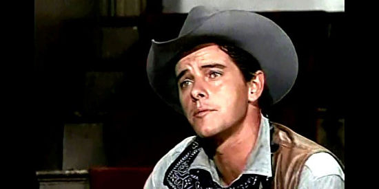 Peter Brown as Chad Cooper, arguing about who has first dibs on a gunfight with Trampas in Backtrack! (1969)