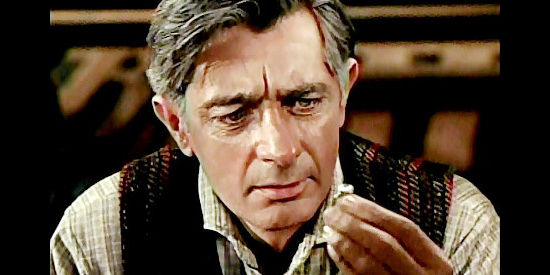 Royal Dano as aging Shiloh ranch hand Faraway, realizing the ring Trampas is trying to sell him for $50 is a piece of junk in Backtrack! (1969)