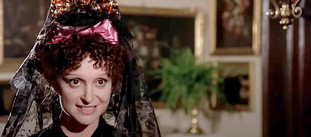 Adriana Asti as Miguel's eccentric Aunt Carmen, expressing her disinterest in family matters in Zorro (1975)