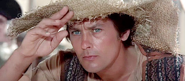 Alain Delon as Don Diego, going undercover to find out what life is like for the peasants living in Nuova Aragona in Zorro (1975)