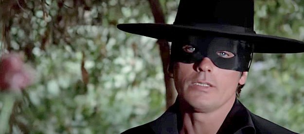 Alain Delon as Zorro, promising to give Contessina Ortensia a reason to smile again in Zorro (1975)