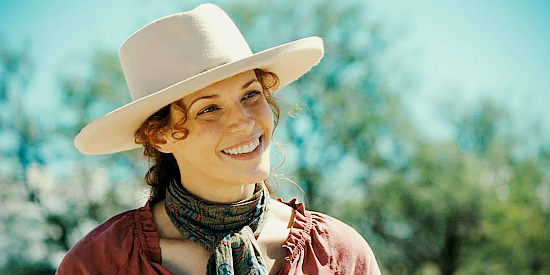 Amanda Righetti as Lily Rayne, the school teacher who takes an interest in Hunter Braddock in Far Haven (2023)i