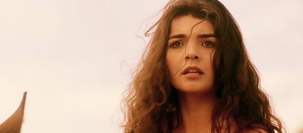 Ara Celi as Esmeralda, relying on an outlaw to escape her ultra strict father in From Dusk Till Dawn 3, The Hangman's Daughter (1999)