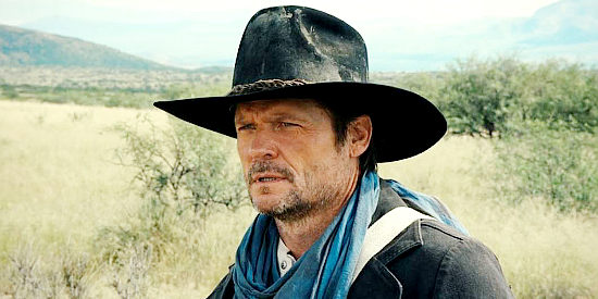 Bailey Chase as Hunter Braddock, returning from prison branded a traitor and coward in Far Haven (2023)