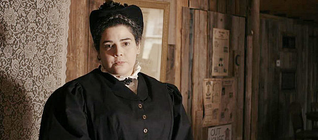 Denise Villarreal as Maggie Grant, insisting to see her son before he's taking to Fort Grant, possibly to hang, in The Oldest Posse (2023)