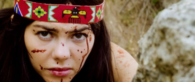 Larissa Dali as Coyote Woman, aka Cynthia Long, engaged in a fight to the death in Coyote Woman (2024)