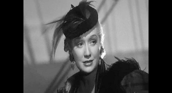 Miriam Hopkins as Mary Rutledge, ready to embrace a new life as she arrives in San Francisco in Barbary Coast (1935)