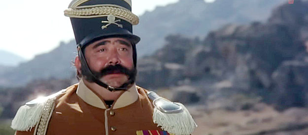 Moustache as Sgt. Garcia, the overweight and simple-minded officer assigned the duty of protecting the governor in Zorro (1975)