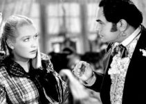 Miriam Hopkins as Mary Rutledge, recoiling from the jealous fury of Luis Chamalis (Edward G. Robinson) in Barbary Coast (1935)