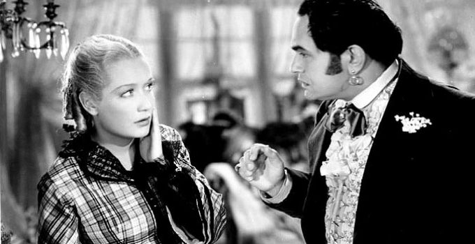 Miriam Hopkins as Mary Rutledge, recoiling from the jealous fury of Luis Chamalis (Edward G. Robinson) in Barbary Coast (1935)