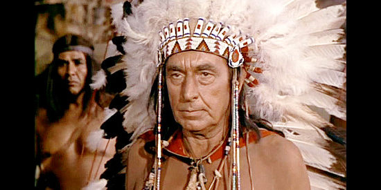 Douglas Drumbrille as Chief Powhatan, reluctantly agreeing to a marriage between Pocahontas and John Smith in Captain John Smith and Pocahontas (1953)