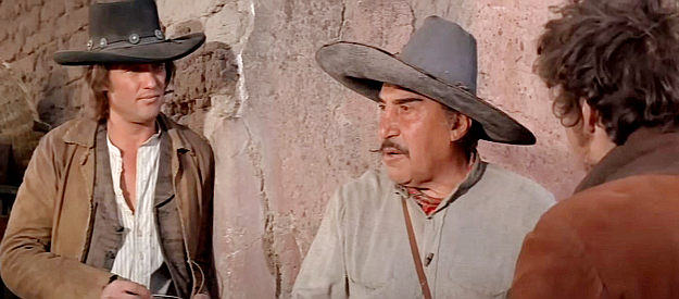 Emilio Fernandez as Paco, getting a warning that Chisum can't be trusted in Pat Garrett and Billy the Kid (1973)