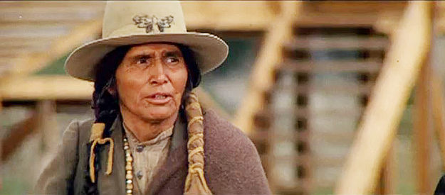 Frank Kaquitts as Sitting Bull, joining the Buffalo Bill show in hopes of meeting the president in Buffalo Bill and the Indians (1976)