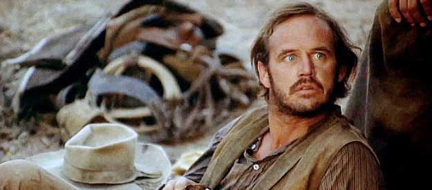 Geoffrey Lewis as Frank Caldwell, leader of the group of cowboys hired as replacements in The Culpepper Cattle Co. (1972)