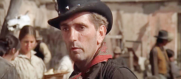 Harry Dean Stanton as Luke, wondering what Pat Garrett's new badge will mean to Billy and his friends in Pat Garrett and Billy the Kid (1973)