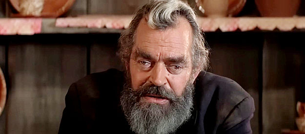 Jack Elam as Alamosa Bill, one of the man who pins on a badge and joins the hunt for Billy in Pat Garrett and Billy the Kid (1973)