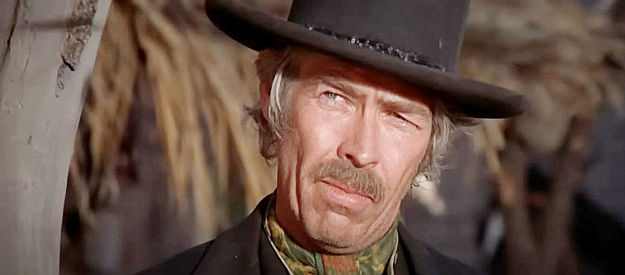 James Coburn as Pat Garrett, knowing he has to rid the territory of Billy the Kid in Pat Garrett and Billy the Kid (1973)