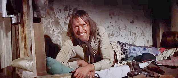 Luke Askew as Eno, watching Billy reclaim a whore from Luke after breaking out of jail in Pat Garrett and Billy the Kid (1973)