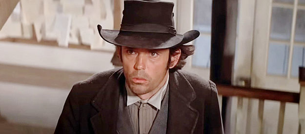 Matt Clark as J.W. Bell, surprised to see a pistol in the hand of his prisoner in Pat Garrett and Billy the Kid (1973)