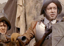 Anthony Dexter as John Smith (right), awaiting an Indian attack in Jamestown in Captain John Smith and Pocahontas (1953)