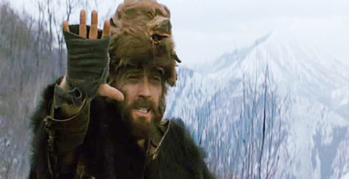 Robert Redford as Jeremiah Johnson, giving the sign of peace to an Indian he meets in Jeremiah Johnson (1972)