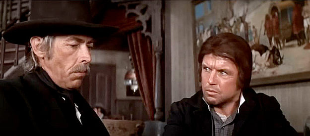 Richard Jaeckel as Sheriff Kip McKinney, balking at the notion of helping Pat Garrett (James Coburn) track down Billy in Pat Garrett and Billy the Kid (1973)