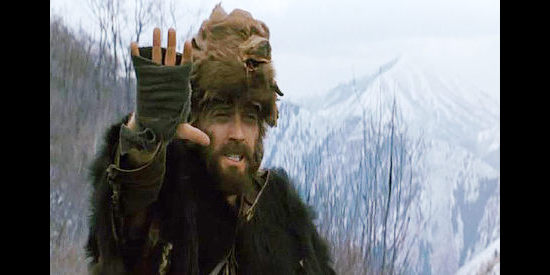 Robert Redford as Jeremiah Johnson, giving the sign of peace to an Indian he meets in Jeremiah Johnson (1972)