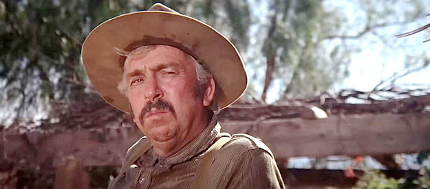 Slim Pickens as Sheriff Cullen Baker, willing to go after Billy, but only for a price in Pat Garrett and Billy the Kid (1973)