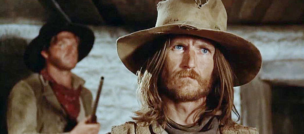 Wayne Sutherlin as Missoula, one of Frank Culpepper's men, facing overwhelming odds at the moment in The Culpepper Cattle Co. (1972)