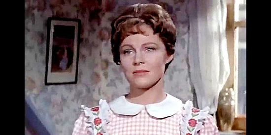 Zena Walker as Julie Hargis, pregnant and pleading with her husband not to put himself in danger in The Hellions (1961)