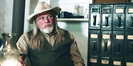 Charlie Motley as Sheriff Hoyt, wondering how Solomon took such an evil turn in Ghost Town (2023)